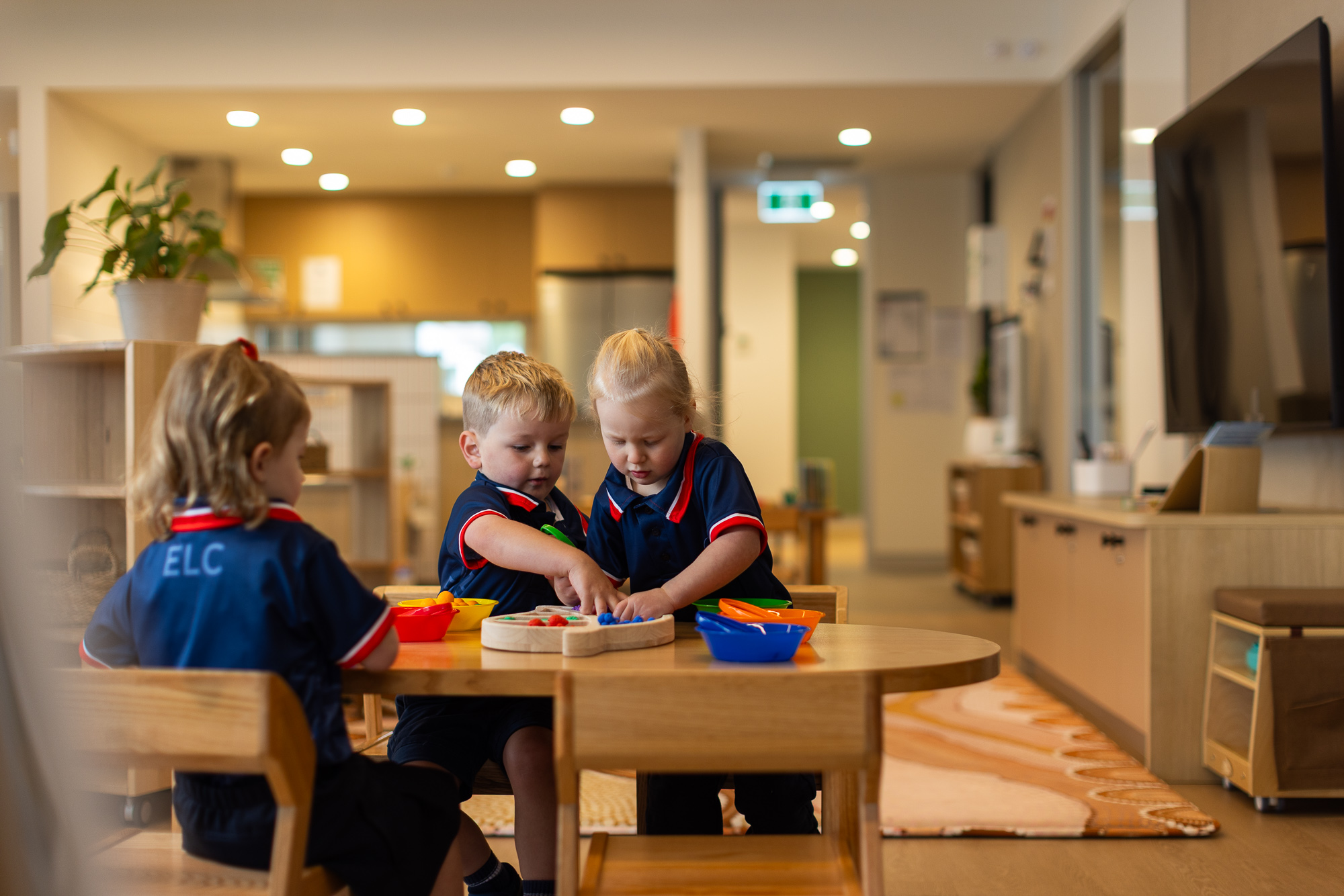 Children exploring the outdoor play area at St Michael’s Early Learning Centre